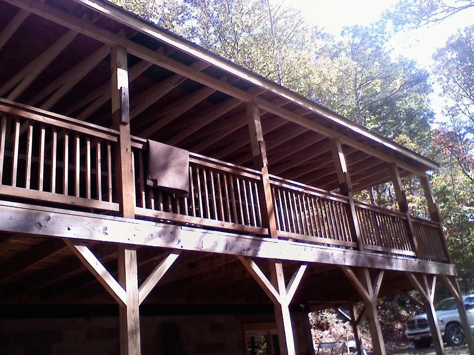 Timber framing under a new elevated porch and deck — Roof Leak Repair in Winona Lake by Roofing Brothers